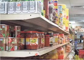  ?? PRERANA SANNAPPANA­VAR/ARGUS LEADER ?? Products lined at Mogadishu Grocery Store during an Augustana University Halal market shopping trip on March 9 in Sioux Falls.