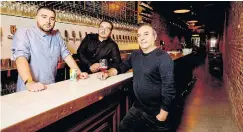  ?? CARLOS OSORIO TORONTO STAR FILE PHOTO ?? Brothers Julian, left, and Tomas Morana with their father, Ralph, at Bar Volo. Ralph Morana says he would like to see landlords offer rent deferrals or breaks to businesses struggling because of the COVID-19 pandemic.