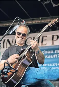  ?? RP-ARCHIVFOTO: RM- ?? Ein Heimspiel hat am 1. August die Band „Triple Sec“(Bild: Gitarrist Oliver Schwung), die schon dreimal bei „Langenfeld live“dabei war.