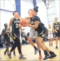  ?? Photo by Ernest A. Brown ?? Davies Tech forward Thalia Phillipe (right) scored 11 points in the Patriots’ 60-28 Injury Fund victory over BVP Thursday.