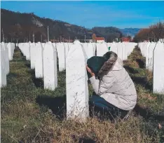  ?? Pictures: AFP ?? GRIEF: A woman at a relative’s grave at the memorial centre of Potocari near Srebrenica; and (below) a Bosnian Muslim women cries over a loved one’s coffin.