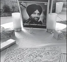  ?? ED GONZALEZ/TWITTER ?? A makeshift memorial of Sandeep Singh Dhaliwal, the first Sikh police officer in Texas.