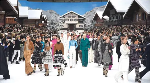  ??  ?? A wintery alpine village created within the Grand Palais was the set for the Chanel fall-winter 2019 collection and (left) actress Penelope Cruz in the Chanel show. — WP-Bloomberg photos by Jonas Gustavsson