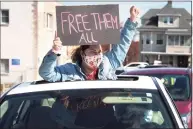  ?? Ned Gerard / Hearst Connecticu­t Media ?? A woman takes part in a protest outside the Bridgeport Correction­al Center on April 15, 2020.