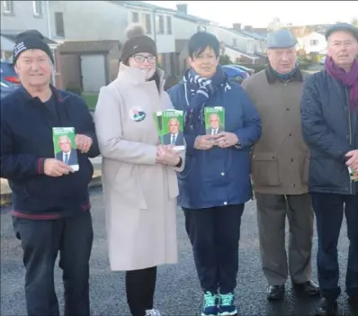  ??  ?? A group with Fianna Fáil candidate in the General Election, Declan Breathnach on the Carrick Road.