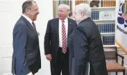  ?? New York Times ?? President Trump met with senior Russian officials hours after dismissing FBI Director James Comey.