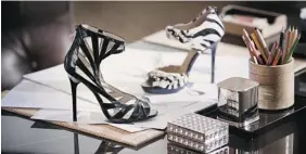  ??  ?? Jimmy Choo went from manufactur­ing 7,300 pairs of shoes in 1997 to 180,000 in 2004, more than Manolo Blahnik, writes Mellon in her book, In My Shoes.