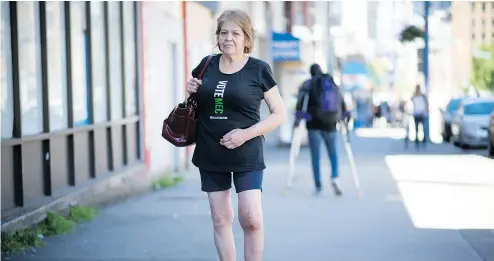  ?? JONATHAN HAYWARD / THE CANADIAN PRESS ?? Lorna Bird says she was forced to buy drugs from the Downtown Eastside streets of Vancouver when her doctor stopped prescribin­g an opioid for knee pain in response to new standards aimed at preventing fatal overdoses.