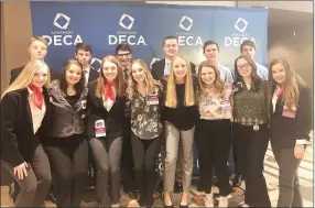  ?? Photograph submitted ?? Pea Ridge DECA students attending the State Career Developmen­t Conference included, front from left: Olivia McCracken, Masie Foltz, Emily Beck, Riley Robbins, Josie Taylor, Nalea Holliday, Madison Fortner and Alyssa Anderson; and back from left: Jake Taylor, Austin Miller, Evan Larsen, Jacob Dixon, Garrison Artman and Keaton Weston.