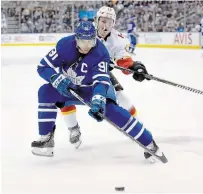  ?? CANADIAN PRESS FILE PHOTO ?? John Tavares, front, and other Leafs have donated money to support front-line workers at two hospitals in the Toronto area — Trillium Health Partners and Mount Sinai Hospital.