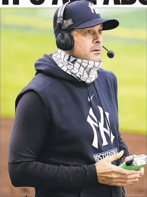  ?? AP PHOTO ?? Aaron Boone wants to make sure all of his players get analytics results in more efficient way than took place in 2020.