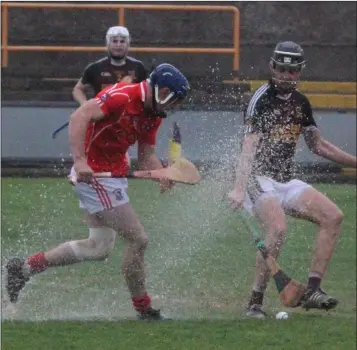  ??  ?? The surface water denies Eddie Power of Fethard near the end of Saturday’s quarter-final.