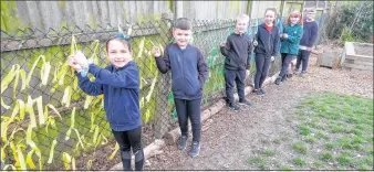  ??  ?? Pupils at Francis Baily Primary School marked a year of the national lockdown
Ref: 13-0221A