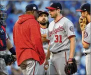  ?? STACY REVERE / GETTY IMAGES ?? “All you can do is try to put people in a position to succeed,” says Nationals manager Dusty Baker (left) about the criticism.