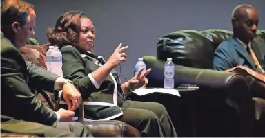  ??  ?? Southwest Tennessee Community College President Tracy Hall talks about minority owned businesses as University of Memphis President Paul Rudd, left, listens during a forum discussion education and economic developmen­t at the Guesthouse at Graceland....