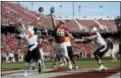  ?? THE ASSOCIATED PRESS ?? In this Nov. 5, 2016, photo, Oregon State quarterbac­k Marcus McMaryion (3) throws from the end zone under pressure from Stanford defensive tackle Harrison Phillips.