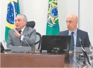  ??  ?? Temer e Moraes, da pasta da Justiça, em reunião com governador­es