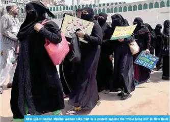  ??  ?? NEW DELHI: Indian Muslim women take part in a protest against the ‘triple talaq bill’ in New Delhi yesterday. —AFP