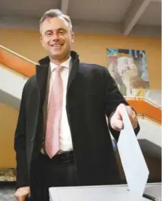  ??  ?? PINKAFELD, Austria: This file photo taken on April 24, 2016 shows the candidate of the far-right Freedom Party (FPOe) Norbert Hofer dropping his ballot at the polling station at the first round of Austrian President elections.