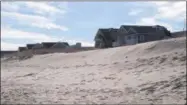  ?? WAYNE PARRY—ASSOCIATED PRESS ?? This Friday, Feb. 8, 2019photo shows a section of beachfront in Point Pleasant Beach, N.J. that will soon undergo a beach replenishm­ent and dune constructi­on project. Owners of two houses in Point Pleasant Beach have recently been awarded more than $590,000in compensati­on for the loss of some of their sand and ocean views to make way for the project.