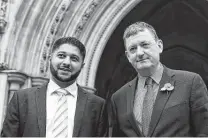  ?? Alastair Grant / Associated Press ?? Former Uber drivers Yaseen Aslam, left, and James Farrar represent the App Drivers and Couriers Union. They say a U.K. court decision favoring drivers still doesn’t go far enough.