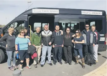  ??  ?? Scott Geering (centre with glassses) and the Help for Heroes team set off.