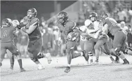  ?? MICHAEL LAUGHLIN/SOUTH FLORIDA SUN SENTINEL ?? University School’s Max Balthazar waits for his blocks against Cardinal Gibbons during their 4A regional semifinal game on Nov. 15, 2019. Balthazar may be one player who will play for TRU Prep Academy this season after U-School decided not to field a football team.