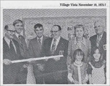  ?? Courtesy Bella Vista Historical Museum ?? The caption with this picture from the November 19, 1975 Village Vista reads, &#x201c;The first white cane metric stick presented to a school was presented in the third grade of the Thomas Jefferson School in Bentonvill­e. Shown left to right are: James Beckloff, principal, Cecil Boothe, assistant principal, Marvin Higginbott­om, superinten­dent of schools, Dick Molter, Lions Club president, Mrs. Clyde Crow, third grade teacher, Sheila Ginn and Holly Richardson, third grade students, and J. Fred Smith, originator of the stick.