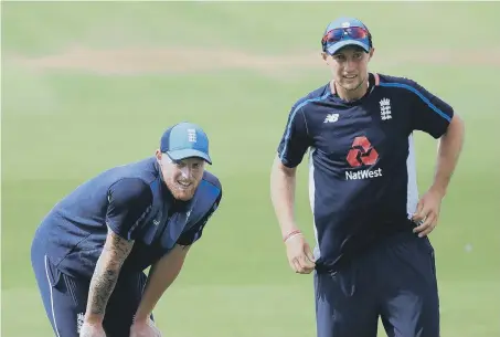  ??  ?? Ben Stokes and England captain Joe Root in training yesterday.