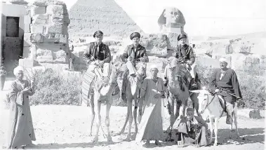  ??  ?? Francis Nye, center, rode to the Pyramids on camelback during his service in Egypt.