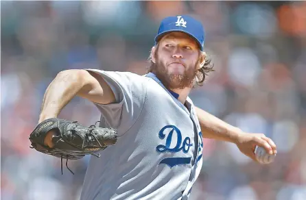  ?? AP-Yonhap ?? Los Angeles Dodgers pitcher Clayton Kershaw works against the San Francisco Giants in the first inning of a baseball game in San Francisco, Wednesday.