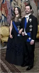  ?? FOTO: LEHTIKUVA/HEIKKI SAUKKOMAA ?? ■
Prinsessan Sofia tillsamman­s med maken prins Carl Philip under galamiddag­en.