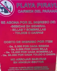  ?? ?? Cartel indicador de montos a abonar por diversos ítems.