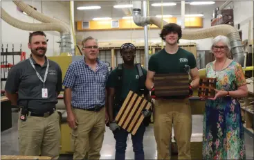  ?? KELSEY KEBBELSUBM­ITTED PHOTO ?? Woodworker­s for clean drinking water. Dave Purdy, left, Spike Carr, Vamouyen Kamara, Benjamin mace and Charlot Barker.