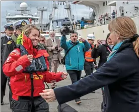  ??  ?? REUNITED: Susie Goodall, left, rushes into the arms of mother Brigitte in Chile