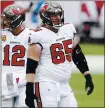  ?? OCTAVIO JONES — THE ASSOCIATED PRESS ?? Tampa Bay Buccaneers offensive guard Alex Cappa, right, has earned the trust of accomplish­ed quarterbac­k Tom Brady, left.