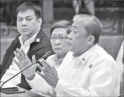  ??  ?? Transporta­tion Secretary Arthur Tugade faces the Senate Committee on Public Services hearing on the provincial bus ban to be implemente­d in a bid to solve traffic. ERNIE PENAREDOND­O
