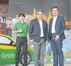  ?? ?? Mr Nithee, centre, and Mr Worachat, right, launch the ‘Amazing Thailand, Travel confidentl­y with Grab’ campaign which aims to promote Thai tourism and elevate travel experience­s among local and foreign travellers.