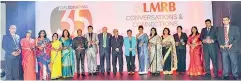  ??  ?? Recipients of long service awards with former CEO's of LMRB Tissa de Alwis, H.L. Cadambi, Preeti Reddy and the current CEO Himalee Madurasing­he