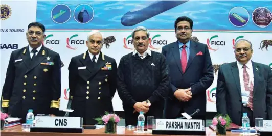  ?? PHOTOGRAPH: FICCI ?? (L-R): Rear Admiral C.S. Rao; Chief of the Naval Staff Admiral Sunil Lanba; Defence Minister Manohar Parrikar; Harshavard­han Neotia; and Jayant D. Patil.