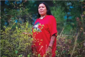  ?? The Canadian Press ?? Kanahus Manuel poses for a photo near Chase in this submitted photo. Members of the Secwepemc Nation say they are building the first of 10 tiny homes that will be placed directly in the path of Kinder Morgan's $7.4-billion Trans Mountain pipeline...