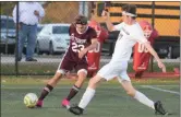  ?? AUSTIN HERTZOG - MEDIA NEWS GROUP ?? Pottsgrove’s Mike Troutman (23) clears the ball as Spring-Ford’s Harry Bastable pressures Tuesday.