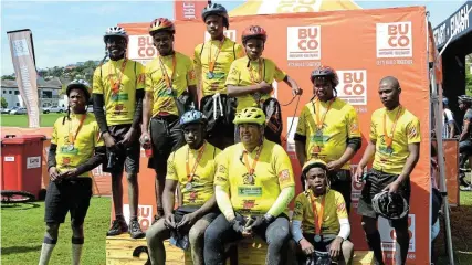  ?? Picture: MARK CARRELS ?? BRIGHT FUTURE: The Ama-Riders developmen­t team brought great team spirit and camaraderi­e to the recent G2C MTB race from Makhanda to Port Alfred. In front with them at the prizegivin­g podium is founder Antony Wannell.