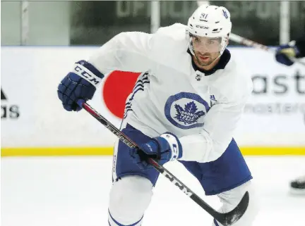  ?? DAVE ABEL ?? Newly acquired Toronto Maple Leafs centre John Tavares participat­es in a workout at the Mastercard Centre in Toronto on Wednesday.