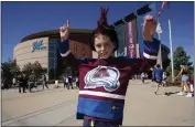  ?? DAVID ZALUBOWSKI — THE ASSOCIATED PRESS FILE ?? Ten-year-old Greyson Goldstein stands outside Ball Arena before Game 1of the Stanley Cup Final between the Tampa Bay Lightning and the Colorado Avalanche on Wednesday, June 15, in Denver.