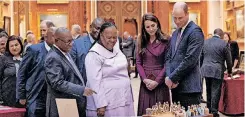  ?? | AFP ?? BRITAIN’S Prince William, Prince of Wales, and Britain’s Catherine, Princess of Wales, with South Africa’s Foreign Minister Naledi Pandor during an exhibition of items from the Royal Collection at Buckingham Palace in London last month. A royal race row has erupted just as the royal couple embark on a tour of the US this week.