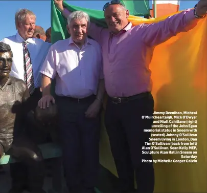  ??  ?? Jimmy Deenihan, Micheal O’Muircheart­aigh, Mick O’Dwyer and Niall Cahillane (right) unveiling of the John Egan memorial statue in Sneem with (seated) Johnny O’Sullivan Sneem living in London, Dan Tim O’Sullivan (back from left) Alan O’Sullivan, Sean...