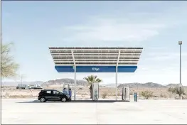  ?? PHILIP CHEUNG — THE NEW YORK TIMES ?? An electric vehicle charging station in Baker, San Bernardino County, in 2019. Documents suggest a Biden administra­tion infrastruc­ture plan would include nearly $1trillion in spending alone on the constructi­on of roads, bridges, rail lines and electric vehicle charging stations.