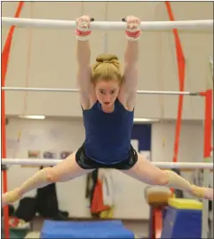  ?? Picture: Colin Mearns ?? Gymnast Cara Kennedy, 20, on the bars