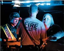  ?? MARK WALLHEISER/GETTY ?? Emergency personnel work outside the Hot Yoga studio in Tallahasse­e, Fla., after a gunman shot several people.